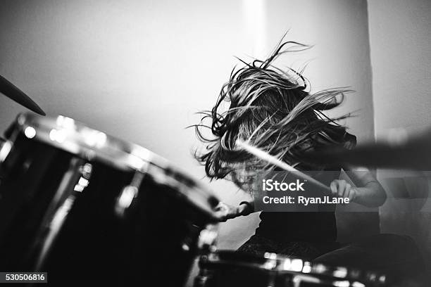 Girl Playing Rock And Roll Drums Stock Photo - Download Image Now - Drummer, Black And White, Rock Music