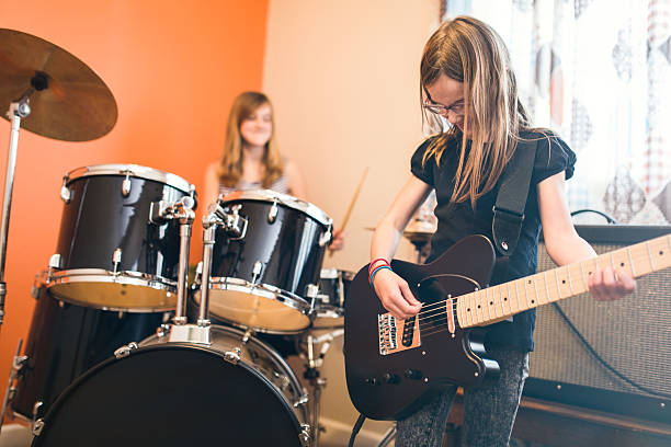 istock Girls Playing Rock and Roll At Home 530507108