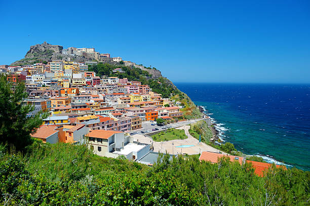Colorful houses and a castle of Castelsardo town Colorful houses and a castle of Castelsardo town in Sardinia castelsardo stock pictures, royalty-free photos & images