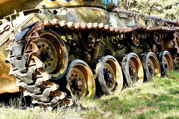 Old rusty tank Old rusty tanks in the forest painted with graffiti. jeep 4x4 off road vehicle world war ii stock pictures, royalty-free photos & images