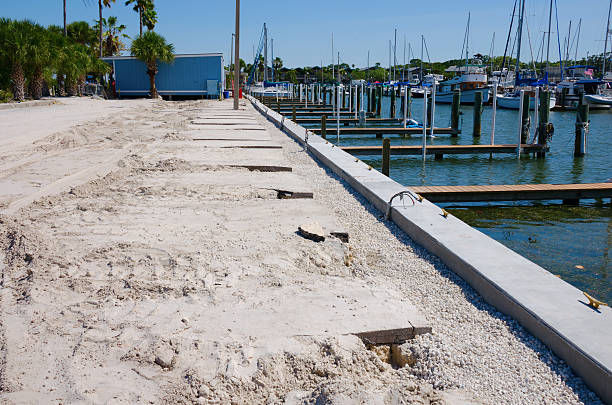 istock Marina dock breakwall and parking lot construction 530509282