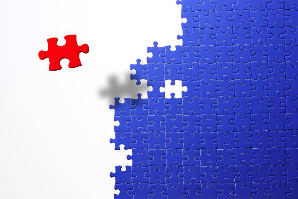 istock Floating a red jigsaw puzzle against blue jigsaw puzzle 530509318