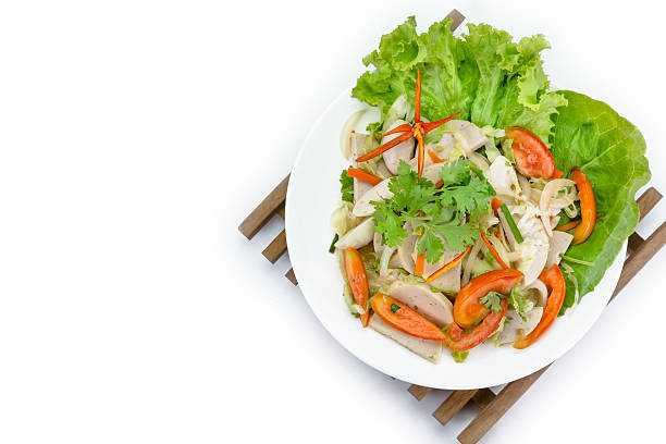 istock spicy pork salad on white background or Yum Moo Yor 530510244