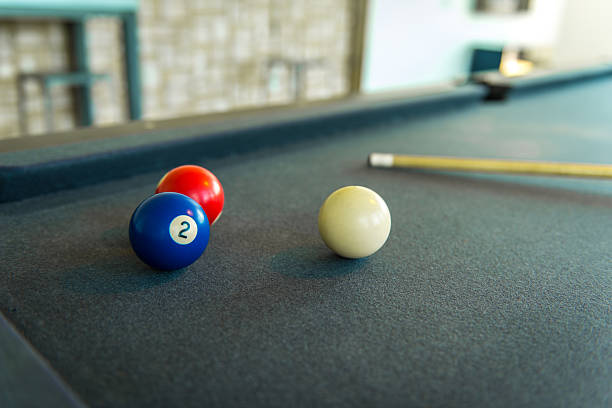 istock Closeup of billiard balls - red, blue and white. 530512270