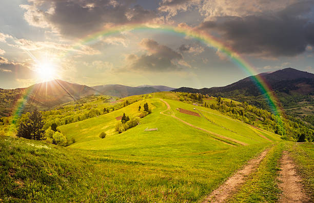 istock fence on hillside meadow in mountain at sunset 530517465