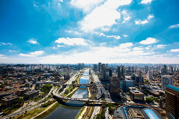 Aerial view river Pinheiros in Sao Paulo City Aerial view river Pinheiros in Sao Paulo City. The Pinheiros River is a river that bathes the city of São Paulo, in São Paulo, Brazil . Born from the encounter of the Guarapiranga River with the Rio Grande and flows into the Rio Tietê. fir tree stock pictures, royalty-free photos & images