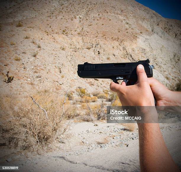 Hand Gun Stock Photo - Download Image Now - Crime, Danger, Desert Area