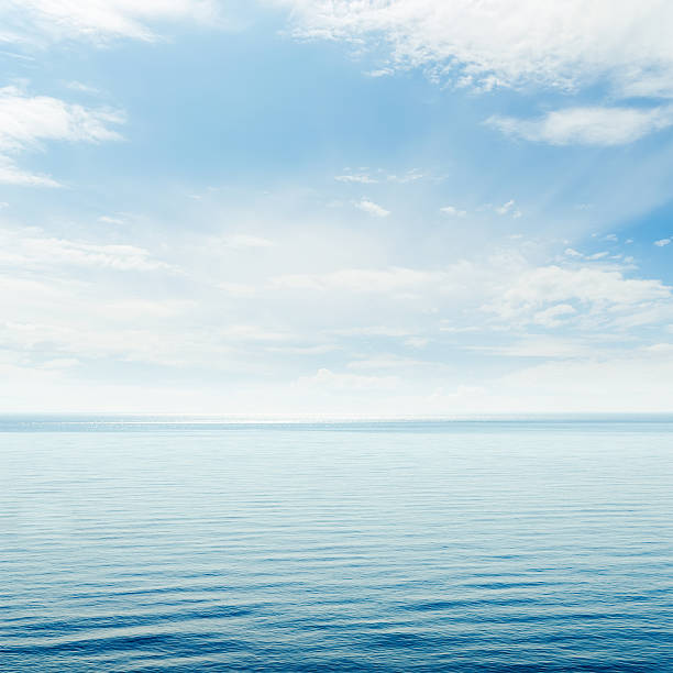 istock blue sea and cloudy sky 530518843