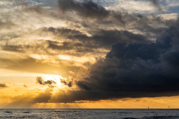 istock Beautiful vibrant seascape at sunset image with dramatic sky and 530521985
