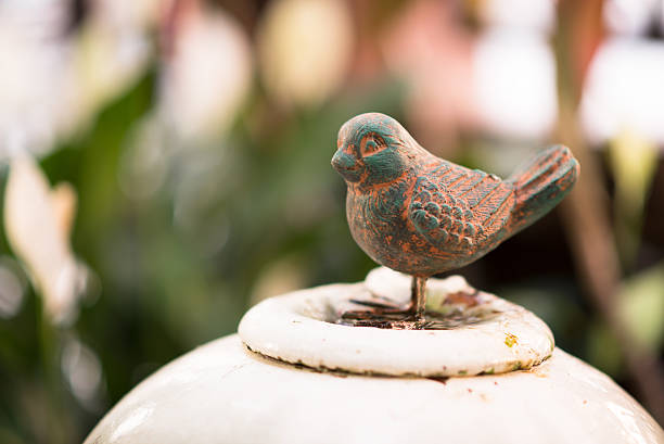 Small bronze bird deccorate in garden