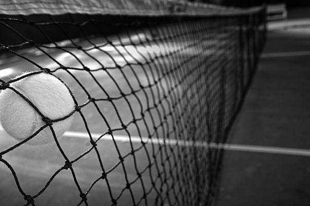 istock Tennis ball in net B & W 530523001