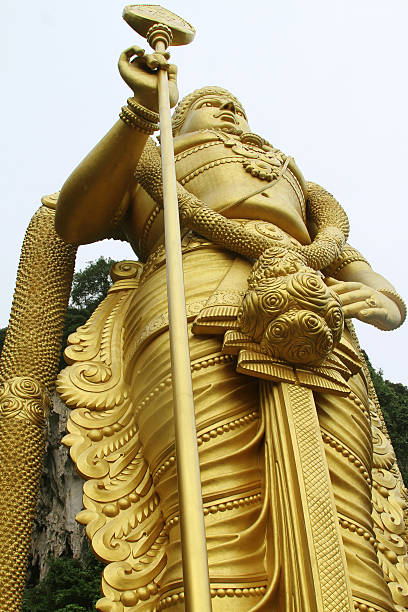 istock Statue Muragan of hindu god gold 530523933