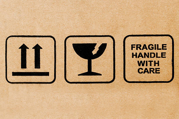 istock Black fragile symbol on cardboard 530526539