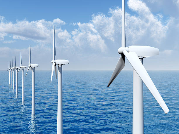 Offshore Wind Farm Computer generated 3D illustration with Offshore Wind Turbines offshore wind farm stock pictures, royalty-free photos & images