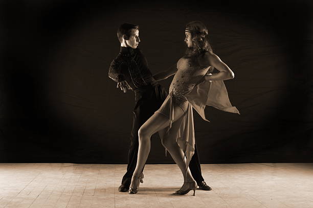 istock Latino dancers in ballroom 530529055