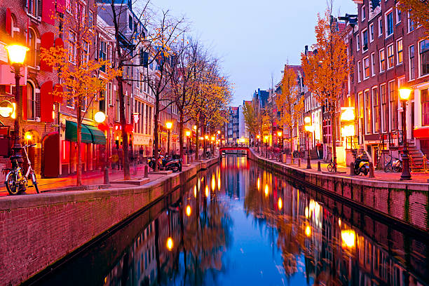Red light district in Amsterdam the Netherlands at night stock photo
