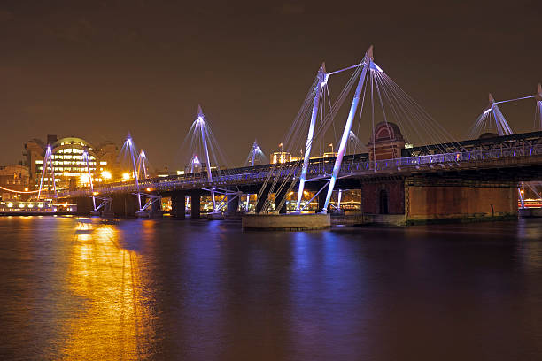 istock Bridge in London UK at night 530530041