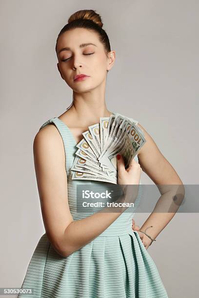 Woman With Money Stock Photo - Download Image Now - Currency, Heap, Stack