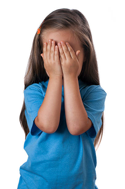 istock Young girl covering her face over 530530095