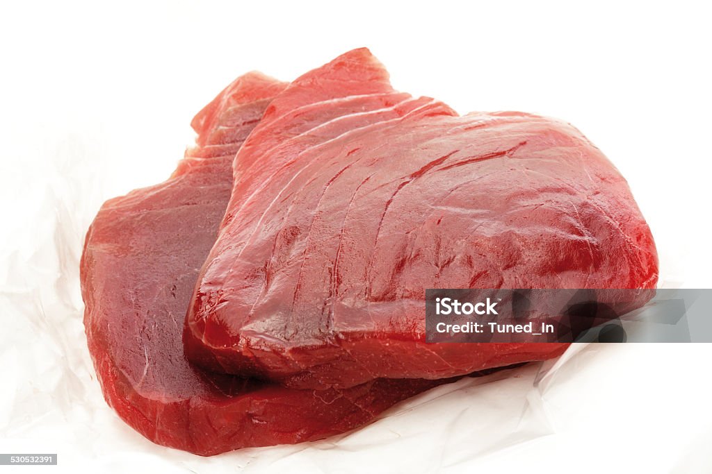 Raw tuna steaks, close-up Activity Stock Photo