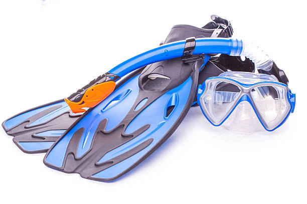 istock Blue diving goggles,snorkel and flippers. isolated 530536781