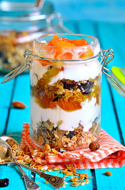 istock Layered dessert from granola,yogurt,persimmon and honey 530537299