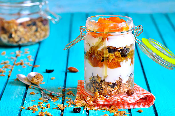 istock Layered dessert from granola,yogurt,persimmon and honey. 530537303