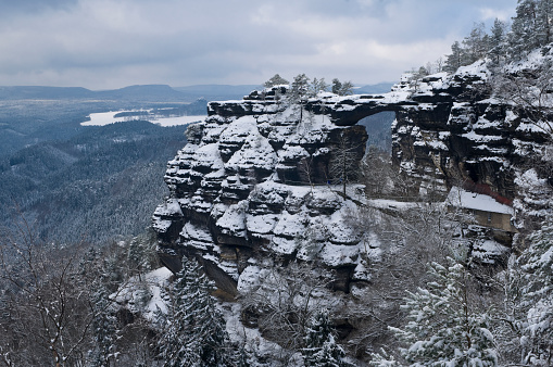 Pravčická brána (German: Prebischtor) in winter - the largest natural sandstone arch in Europe and one of the most striking natural monuments in the Elbe Sandstone Mountains. It is located near the German border in the Bohemian Switzerland, Czech Republic.