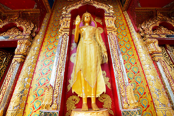 istock Golden Buddha statue in temple ,Thailand 530538057