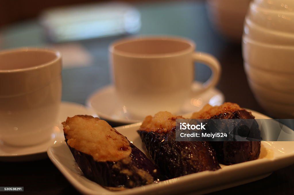 Fried Eggplant and Chinese Tea Fried eggplant and chinese tea Chinese Culture Stock Photo