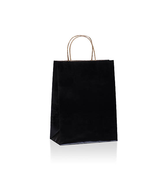 istock Black empty paper bag isolated on white 530541417
