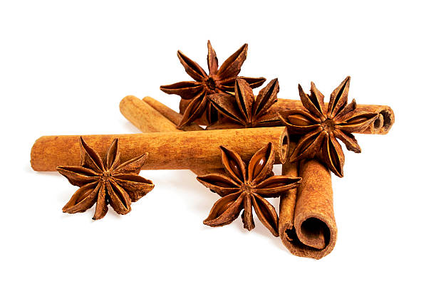 Stars anise and cinnamon isolated on a white background Stars anise and cinnamon isolated on a white background kayu manis stock pictures, royalty-free photos & images