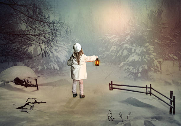  The little girl with the lantern in his hand on the way to Winter Wonderland
