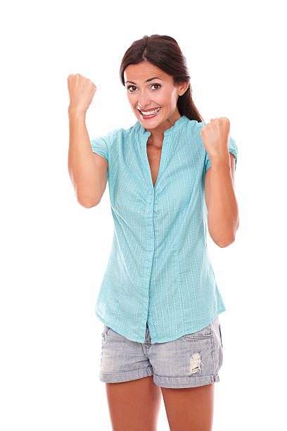 istock Happy lady in blue shirt with arms up 530544419