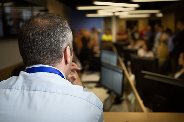 istock Boss Looking over his staff /employes 530546965