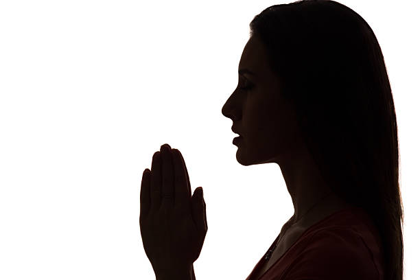 nahaufnahme profil einer frau beten in silhouette isoliert - 5550 stock-fotos und bilder
