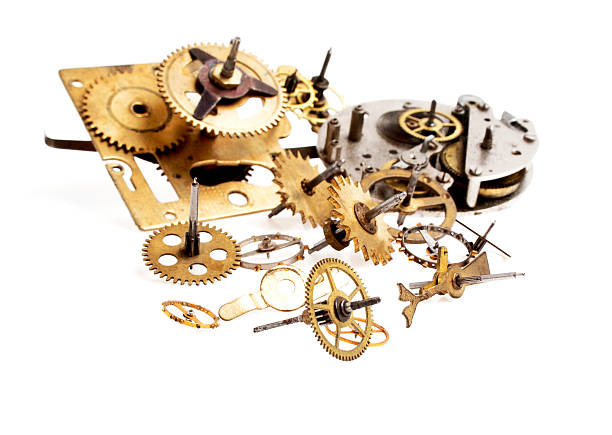 istock Gears from old clock isolated on white background 530547803