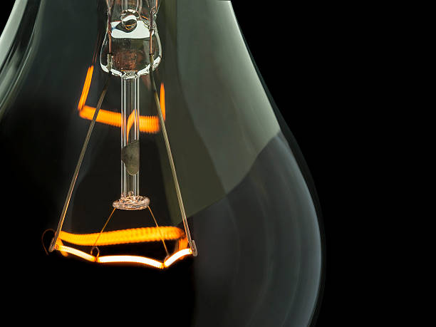 istock close up of glowing element in light bulb 530548085