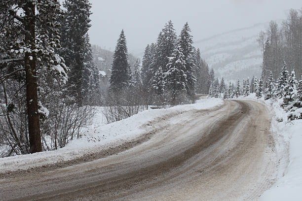 istock snow covered mountain road 530552225