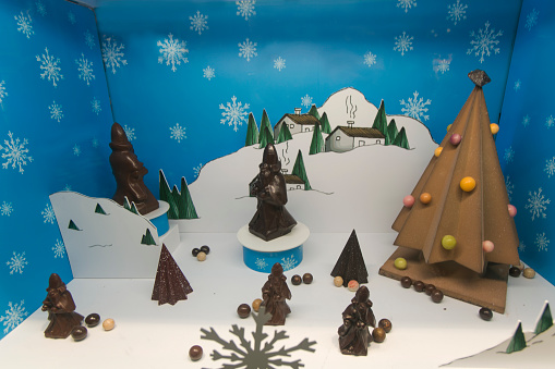 brussel, belgium - December 5, 2014: chocolate christmas decoration with tree and statues is prepared at brussel belgium