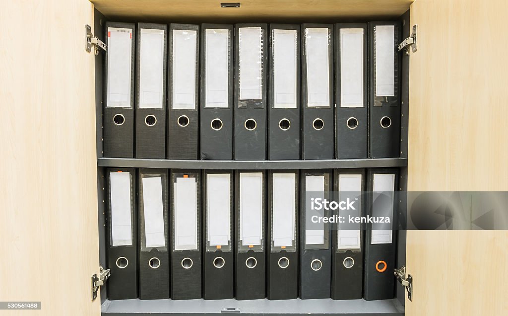 Closeup group of document file in file cabinet background Archives Stock Photo