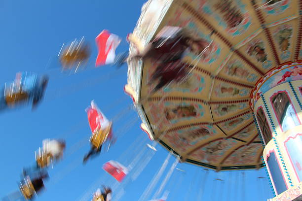istock carousel in motion in closeup 530562345
