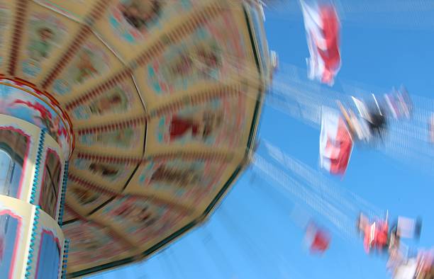 istock carousel in motion in closeup 530562355