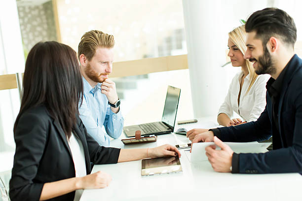istock People working in the office 530562458