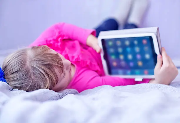 Photo of girl with tablet