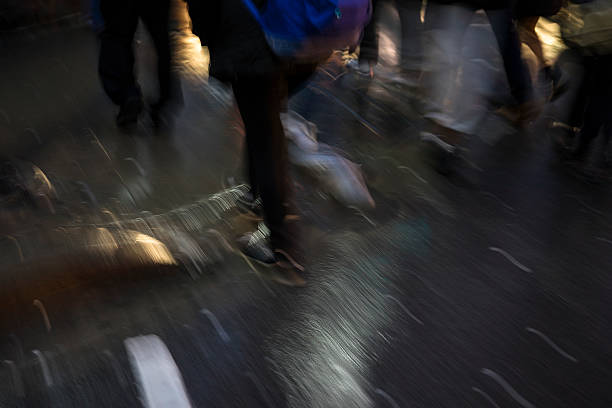 istock People walking in the street 530566031