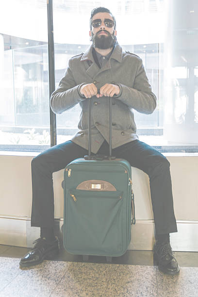 istock Stylish Hipster with luggage 530566063