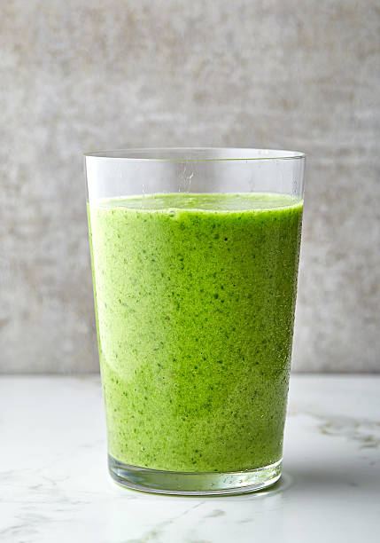 istock glass of green smoothie 530566222