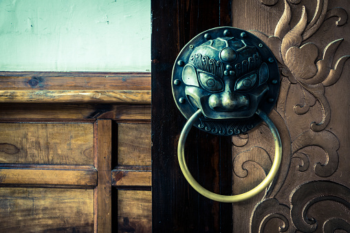 chinese traditional door with lion knocker