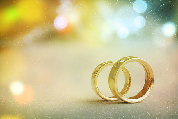 istock Two golden wedding rings 530566910